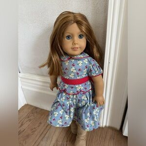 American girl doll (outfit included)